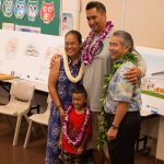 Governor Ige and a family