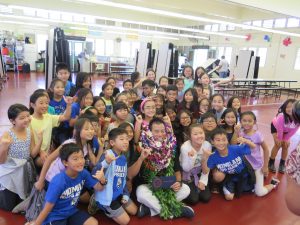 MILKEN WINNERS: Masaru Uchino surrounded by his third graders at Momilani Elementary.