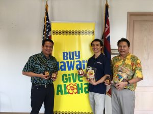 (L-R): DBEDT Director Luis Salaveria, Jimmy Chan, president of Hawaiian Chip Company, Dennis Ling, administrator DBEDT’s Business Development and Support Division