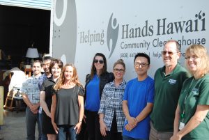 HELPING HANDS: A team of service providers lends support to homeless client Jodi Jennette Inks (fourth from left). From left to right: Jay Parasco, homeless coordinator, City and County of Honolulu; Scott Morishige, state homelessness coordinator; Gladys Peraro, U.S. Vets Waianae; Jodi Jennette Inks, client; Meg Gavigan, team leader for Hawaii Pathways Project (Helping Hands Hawaii and Catholic Charities Hawaii partnership); Heather Pierucki, director of behavioral health for Helping Hands Hawaii; Ching Ying Jao, case manager for Hawaii Pathways Project and Helping Hands Hawaii; Bill Hanrahan, Mental Health Kokua; Leslie Uyehara, Kalihi Palama Health Center