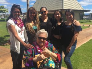 NEW HOMEOWNERS: Doris Woosley with her family and Ho'olimalima neighbors.