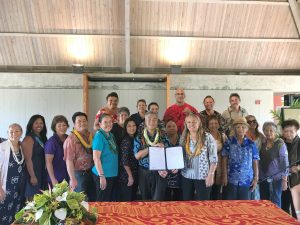 On Molokai, Governor Ige stands with homesteaders and Department of Hawaiian Home Lands officials for the historic bill signing to keep DHHL families statewide on their land.