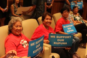 Kupuna Caregiver advocates show their support.