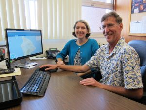PUTTING HDOT ON THE MAP: Gina Belleau and Ron Dedrick work on details to help the public understand decisions for road repair.