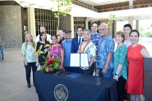 Gov. Ige and legislators make Hawai'i the first state in the nation to enact legislation that abides by the Paris Climate Accord.