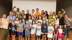 Pearl City Highlands students and supporters celebrate representing the state at the World Lego Festival for robotics.