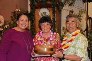 State Employee of the Year Susan Hansen and Director Catherine Awakuni Colon of DCCA with Gov. Ige.