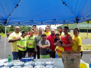 Sergio Mamone (center) and his 'ohana, who helped feed residents displaced by the Kilauea eruption.