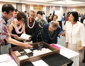 State archivist Adam Jansen describes Gannenmono artifacts at the Japanese Cultural Center.