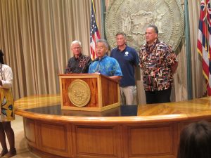 DISASTER AID APPROVED: Gov. Ige, mayors Kirk Caldwell and Bernard Carvalho and FEMA's Dolf Diemont deliver the good news for O'ahu and Kaua'i families.