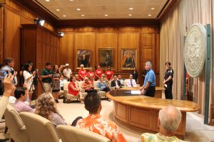 HPD Chief Susan Ballard and advocates join Gov. Ige and legislators for the signing of the bill banning bump stocks and other multi-burst devices.