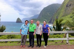(from left) Gregg Fujimoto, president of OTWC/Spectrum; Sen. J. Kalani English; Rep. Lynn DeCoite; and DCCA Director Catherine P. Awakuni Colon on the Kalaupapa Peninsula.