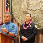 Heather Lusk, HHHRC executive director, and HPD officers join Gov. Ige to announce the new LEAD initiative offering help rather than jail for the homeless.