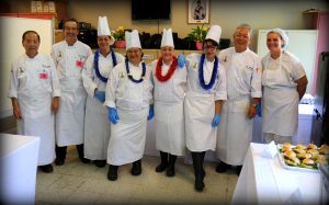 At the Women's Community Correctional Center, graduates and teachers of the Intermediate Culinary Class, one of the skills training programs.