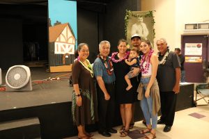 Department of Hawaiian Home Lands director Jobie Masagatani and deputy William Aila with the governor and the Kalena-Dela Cruz family at the lot selection in Kapolei.