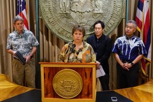 DLNR chair Suzanne Case with Gov. Ige, UH President David Lassner and Attorney General Russell Suzuki.