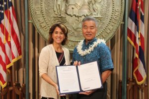 Gov. Ige and DOE Superintendent Christina Kishimoto at the signing of Act 51 to increase computer science education and teacher training in the schools.
