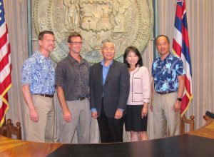 Gov. Ige announces new GEM$ initiative with Murray Clay, Ulupono managing partner; Jay Griffin, Public Utilities Commission chair; Gwen Yamamoto-Lau, director of Hawaii Green Infrastructure Authority; and Scott Seu, VP at HECO.