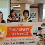 First lady Dawn Amano Ige with (from left) Daniela Kittinger of Hawai'i Appleseed, Central Middle's principal Anne-Marie Murphy, and Dexter Kishida, Department of Education program specialist celebrate the school's 23 percent increase in breakfast participation.