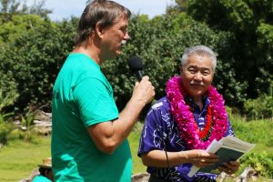 Chipper Wichman, president of the National Tropical Botanical Garden and Ha'ena resident, emceed the community blessing and welcomed Governor Ige.