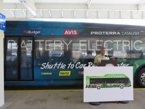 Governor Ige announces a pilot program to select alternative energy buses for the new Conrac facility at the Daniel K. Inouye International Airport in 2021.