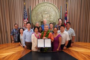 Governor Ige with legislators and affordable housing partners at bill signing.