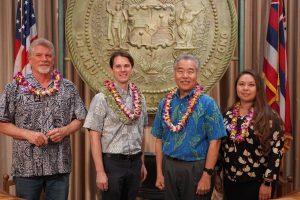 Gov. Ige with members of the State Environmental Council: (from left) Ronald Terry of Hawaiʻi Island, OEQC director Scott Glenn and Council chair Puananionaona (“Onaona”) Thoene.