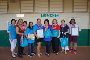 The 'Ohana Readers team with Rep. Lynn DeCoite, Mrs. Ige and coordinator Kui Adolpho.