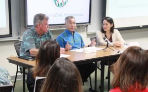 Governor Ige with state Department of Health director Bruce Anderson and epidemiologist Sarah Park at a recent news conference on COVID-19.