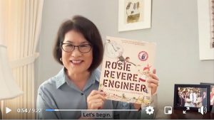 Mrs. Ige with “Rosie Revere, Engineer,” the first book in the Storytime series.