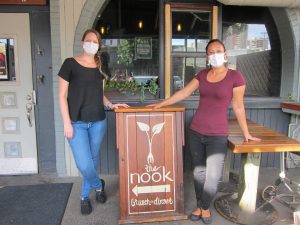 The Nook owners Hailey Berkey (left) and Anicea Campanale find ways to keep their restaurant business alive.