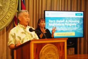 Governor Ige explains the program for housing assistance.