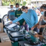 The Kuauli team prepares computers for Hilo distribution.