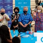 New interim Department of Education superintendent Keith Hayashi, Hawai‘i First Lady Dawn Amano-Ige, Governor Ige and First Lady Dr. Jill Biden congratulate those getting vaccinated at a pop-up clinic at Waipahu High School