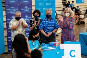 New interim Department of Education superintendent Keith Hayashi, Hawai‘i First Lady Dawn Amano-Ige, Governor Ige and First Lady Dr. Jill Biden congratulate those getting vaccinated at a pop-up clinic at Waipahu High School