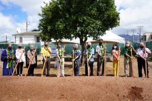 governor and others pose for groundbreaking