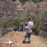 DLNR botanist Adam Williams and Ben Nyberg of the National Tropical Botanical Garden using drones to spot endangered plant species in Kaua‘i’s Waimea Canyon.