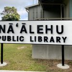 Head librarian Sara Kamibayashi (left) and library assistant Maelene Kaapana.