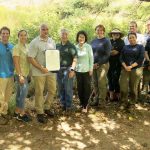 Governor and Mrs. Ige and Kanu Hawai‘i’s Keone Kealoha at Diamond Head.