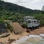 A home collapses onto the beach at Rocky Point on O‘ahu’s North Shore.