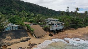 A home collapses onto the beach at Rocky Point on O‘ahu’s North Shore.