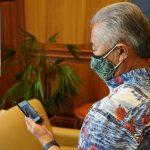 Governor Ige checks out Jason Momoa’s social media challenge.