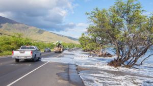 A flooded Maui coastline highway.